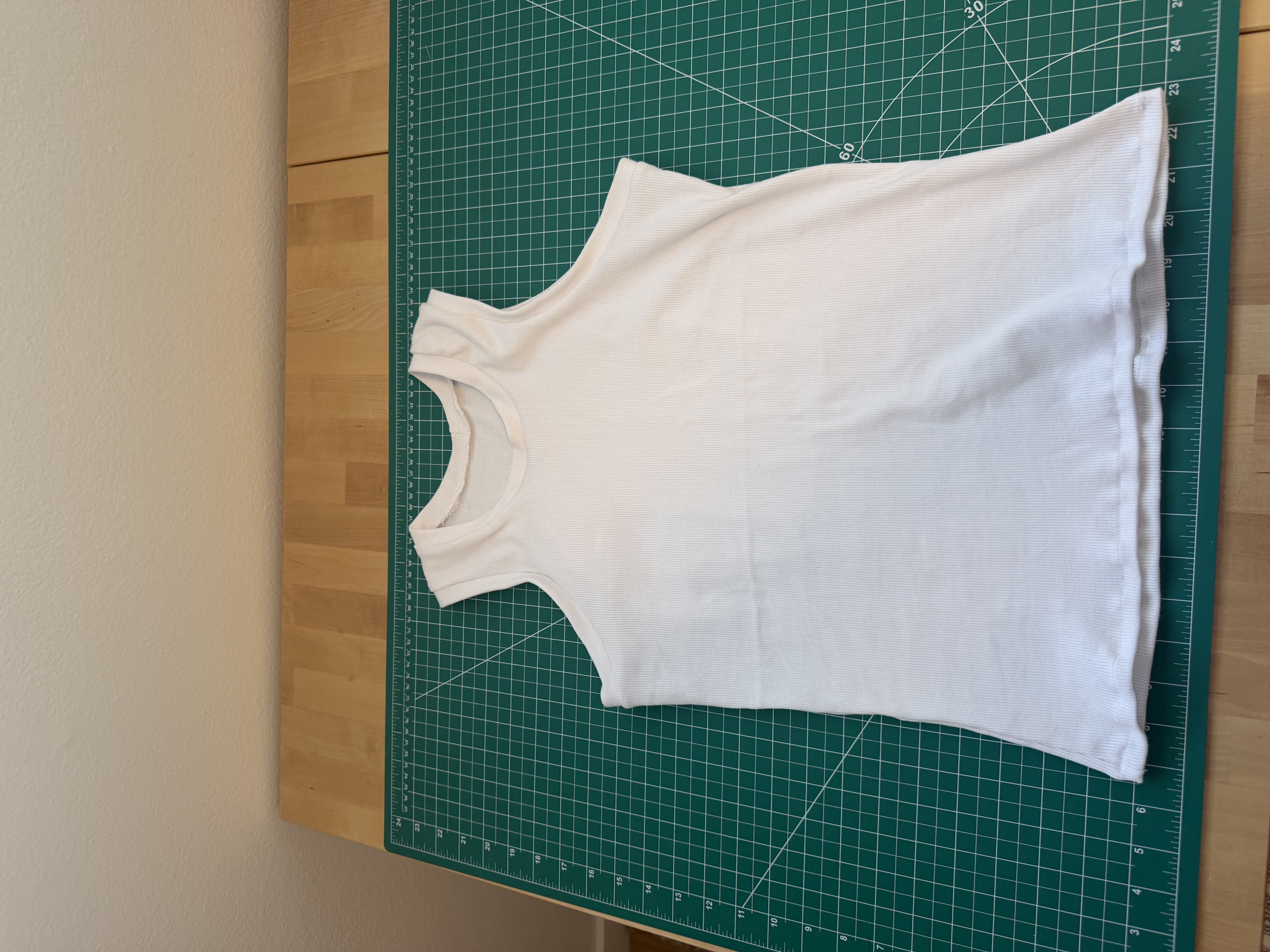 The finished white rib knit Sylvan tank, laid flat